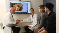 Fady Khoury-Collado, MD and Leslie Moroz, MD consult with patients at the Mothers Center